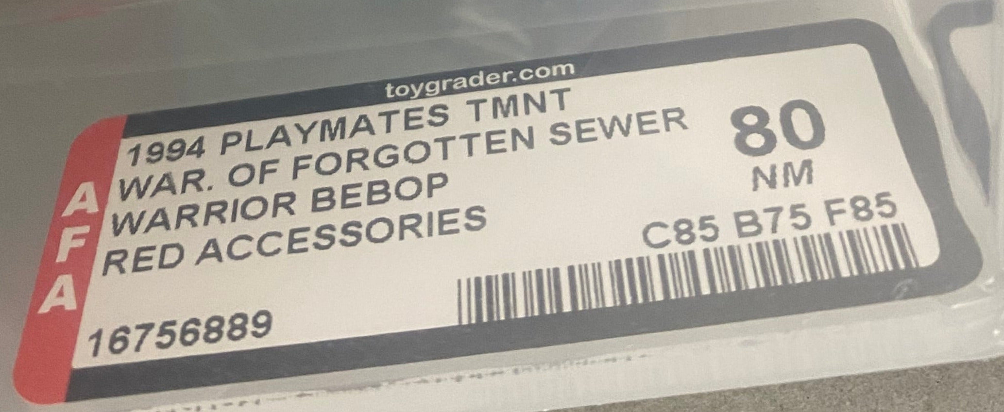 Teenage Mutant Ninja Turtles Warrior Bebop boxed figure AFA graded 80. Label photo close-up.